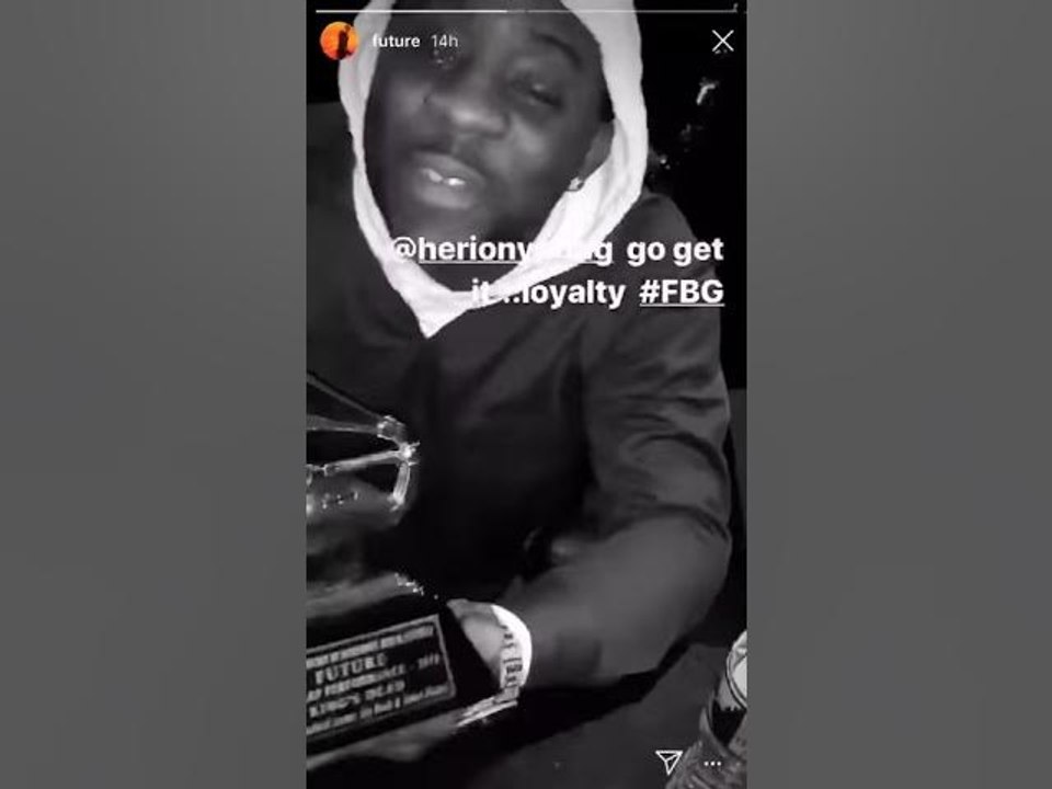 Future Lets Friend Hold His Grammy Award