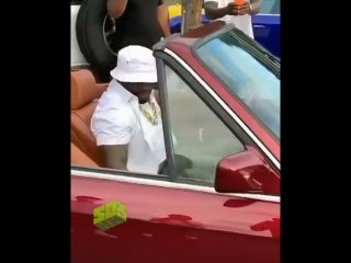 Watch: 50 Cent pulls up in a drop top