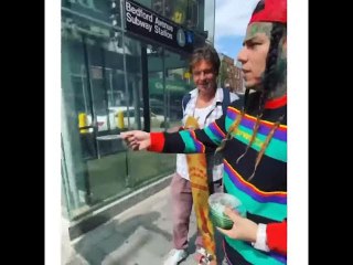 6ix9ine Hands Out Copies Of His Album On The Streets