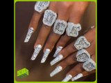 Megan Thee Stallion Gets Iced Out “F*ck You” Rings