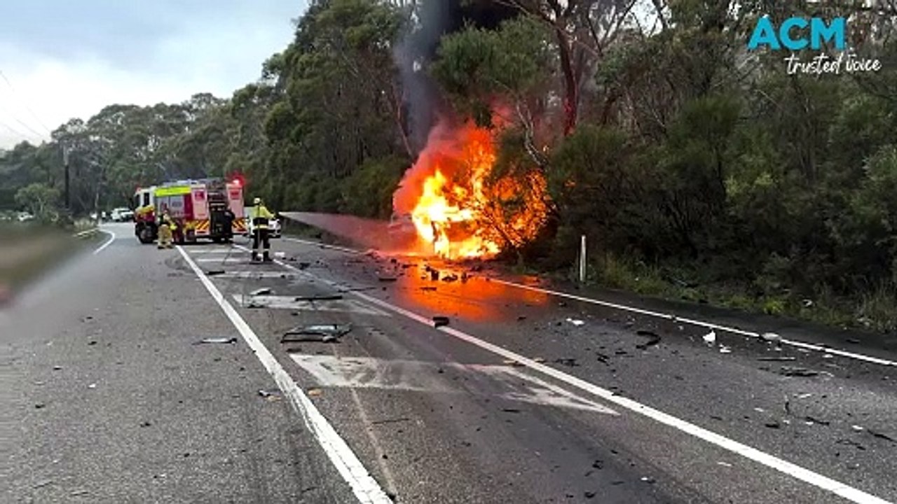 Three people in hospital after car bursts into flames from truck collision on Great Western Highway