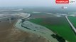 Kuvvetli yağışların etkisini yitirmesiyle göle dönen Amik Ovası'nda sular çekilmeye başladı