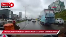 Motokurye otomobilin altında kalmaktan son anda kurtuldu