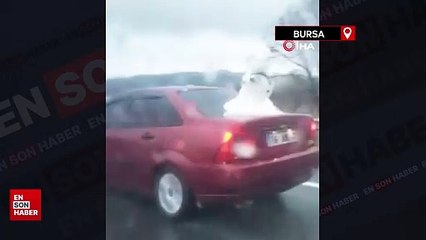 Bursa'da aracının bagajında kardan adamla gezdi