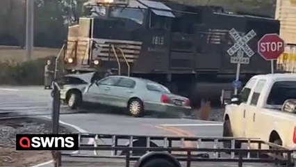 Nail-biting video shows driver fleeing seconds before car gets hit by oncoming train