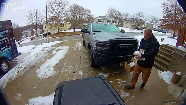 Man Slides Down Driveway and Into Street