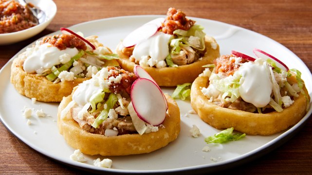 Sopes Are All About The Add-Ons & Refried Beans Might Be The Favorite
