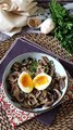 Rice noodles with mushrooms and their soft-boiled egg!