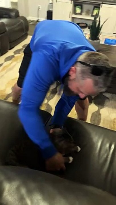 Grumpy Kitty Gets A Kiss