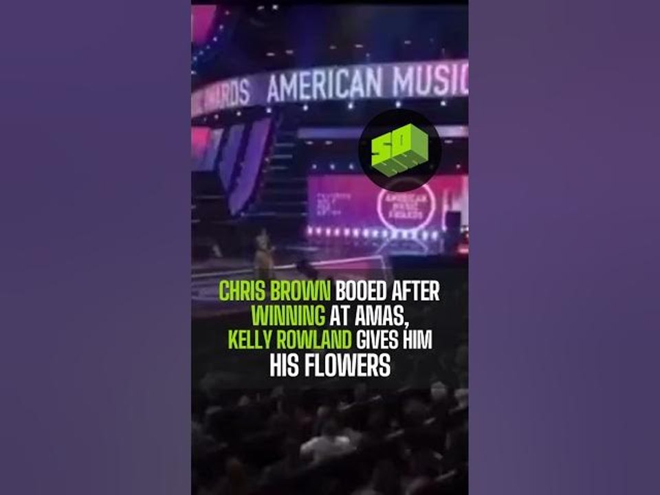 Chris brown Booed After Winning at AMAs, Kelly Rowland Gives Him His Flowers
