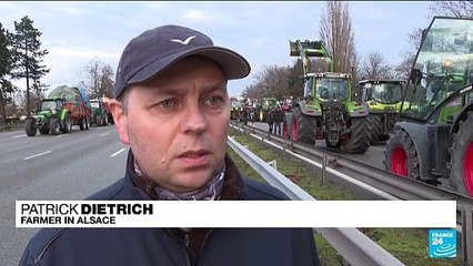 Fuming French farmers pile pressure on Paris