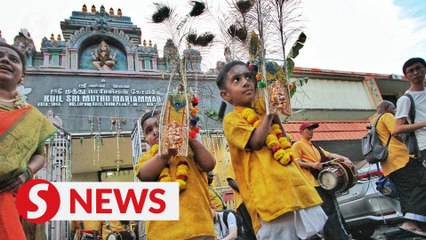 Tiny brothers among faithful kavadi bearers in Penang
