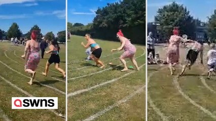 Konkurrenzfähige Mutter schubst andere Mutter am Sporttag aus dem Weg