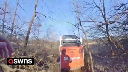 Suspect lifts police officer using construction vehicle before dumping him during pursuit