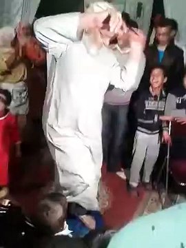 an old moroccan man dancing