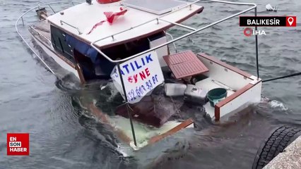 Balıkesir'de limana bağlı tekne, sahibinin gözleri önünde suya gömüldü