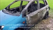 Fire brigade called after abandoned car found torched in field