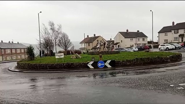 Creggan: St Mary's Church and Maurice Harron's sculpture of the children in Derry