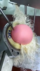 A Doll Receives A Full Head Of Hair