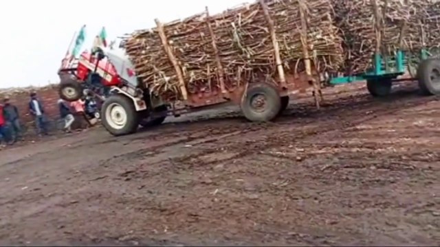 Lift tractor in the air from front side while pulling load sugarcane trolley | how to drive load tractor