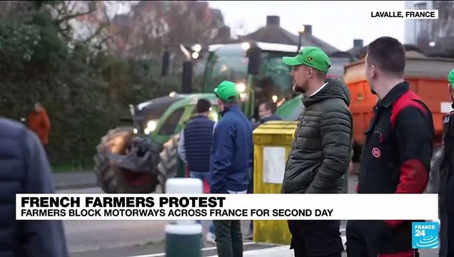 Protesting French farmers inspect foreign trucks amid Paris roadblock