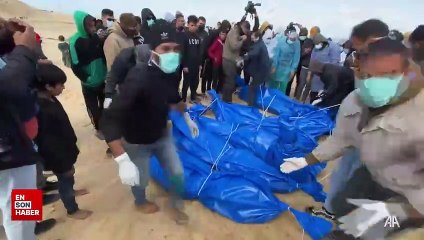 İsrail'in el koyduğu onlarca Filistinliye ait cansız beden toplu mezara defnedildi