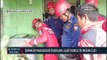 Damkar Makassar Evakuasi Ular Sanca Di Mesin Cuci