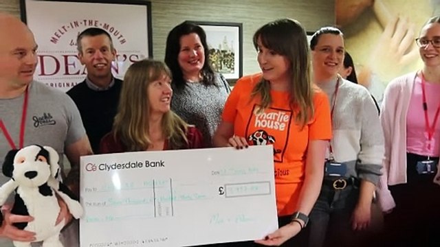 Dean's of Huntly staff show their support for Charlie House