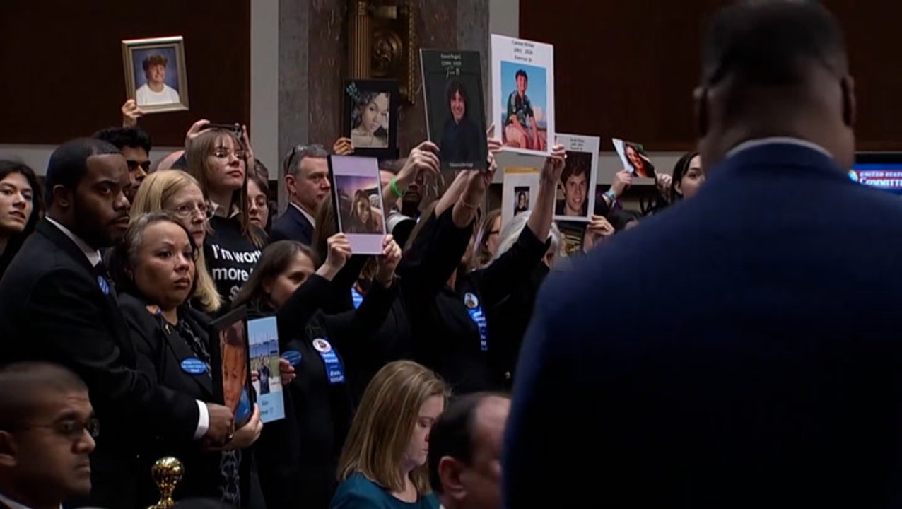 Child victims’ photos held up in silence as tech CEOs arrive at safety hearing