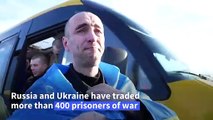 Ukrainian and Russian war prisoners return home