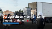Des agriculteurs vident un camion d'épinards italiens à Châteaurenard