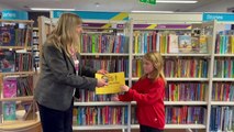 Cat-loving Leah receives a badge and certificate at Crediton Library video by Alan Quick IMG_4603