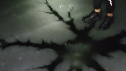 Man discovers cracks in frozen pond left by a lightning strike *Unbelievable*