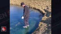 Golf uğruna buz tutmuş göle düşen adam kamerada