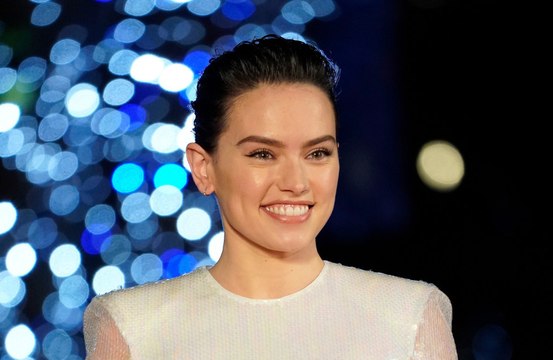 Daisy Ridley keeps her lightsaber safe