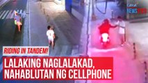 Riding in tandem! Lalaking naglalakad, nahablutan ng cellphone | GMA Integrated Newsfeed