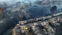 Drone video shows wildfire devastation in Chile as death toll soars to 112 with hundreds still missing.