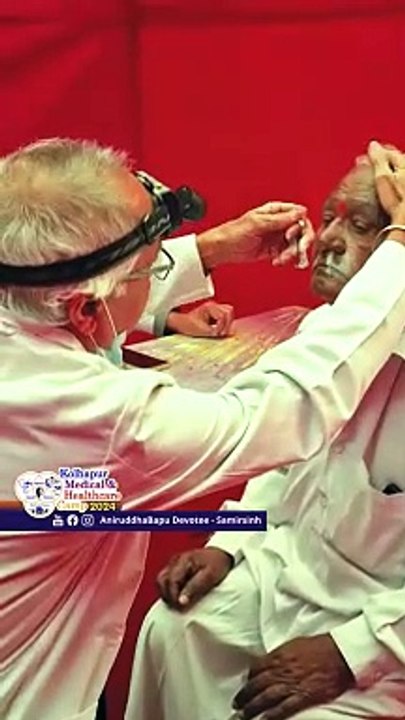 Doctor performing detailed medical checkup of Villager at Kolhapur Medical & Healthcare Camp 2024