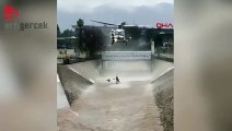 Köpeğinin peşinden kanala atlayan adam helikopterle kurtarıldı