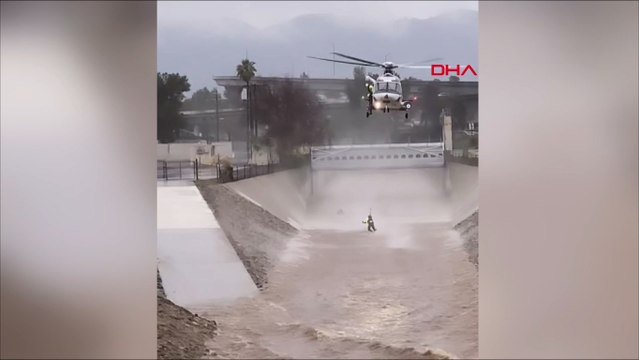 Köpeğinin peşinden kanala atlayan adam helikopterle kurtarıldı