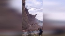 Terrifying landslide buries highway as motorists dodge falling rubble