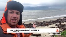 California beach littered and a new flash flood warning in effect