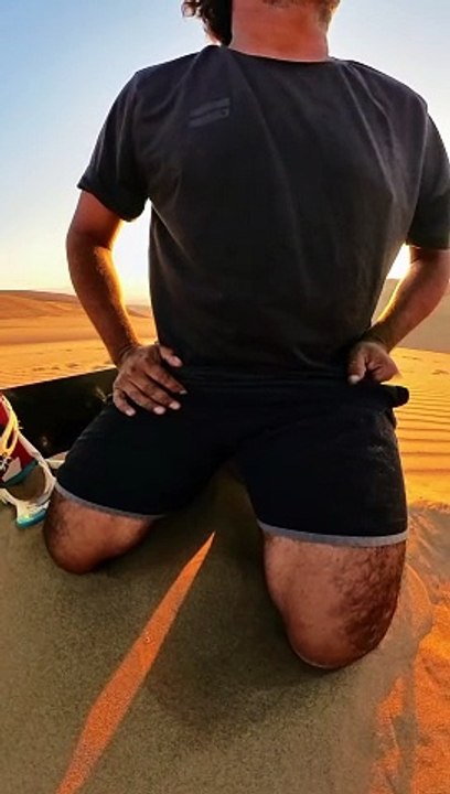Sandboarding On The Dunes