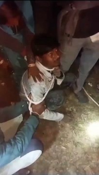 Video: Miscreants caught stealing motor pump, tied with rope and beate