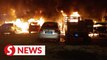 Nine vehicles destroyed in workshop blaze