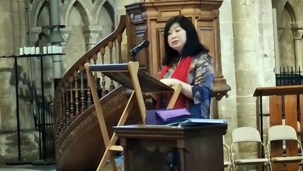 Faustina Yang accepts the King's Award for Voluntary Service