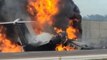 Plane crash lands on Florida highway and bursts into flames