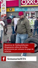 Maestros de telebachillerato bloquean calles.