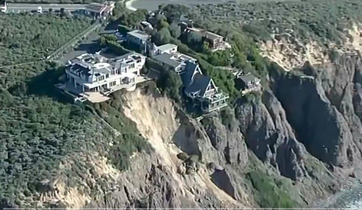 Multimillion-dollar homes teeter on edge of California cliff after landslide