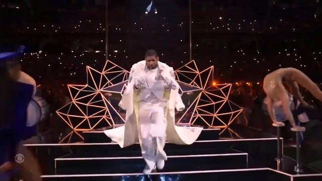 Usher performs medley of hits at Super Bowl half-time show beside special guests